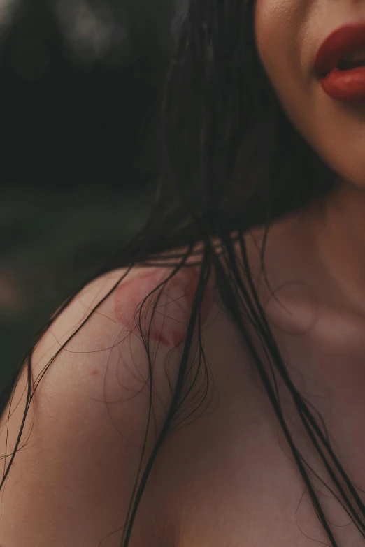 a close up of a woman with wet hair, a tattoo, inspired by Elsa Bleda, trending on pexels, renaissance, cracked body full of scars, buxom chested, a young asian woman, red birthmark