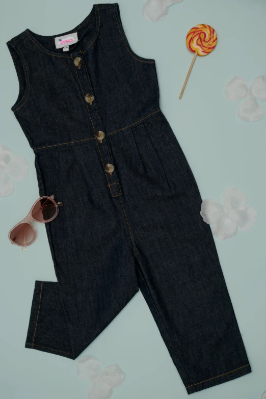 a denim jumpsuit with a lollipop lollipop lollipop lollipop lollipop lollipop lollipop lo, inspired by Jean Hey, zoomed out to show entire image, buttons, hero shot, very simple