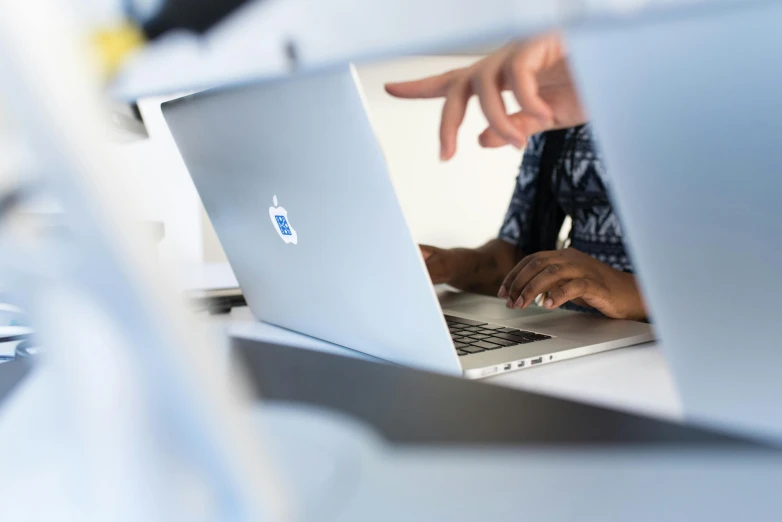 a close up of a person using a laptop, by Daniel Lieske, avatar image, office background, opening shot, thumbnail