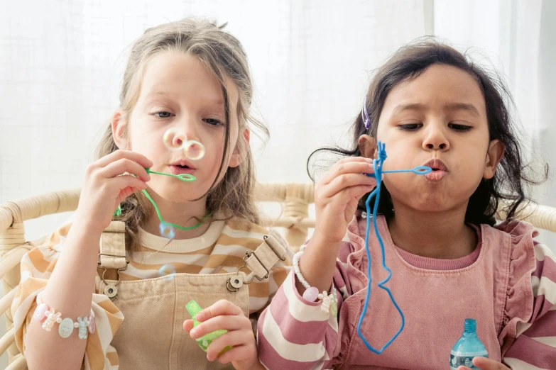 two little girls that are brushing their teeth, pexels contest winner, process art, nebulizer equipment, string theory, children playing with pogs, hooked nose