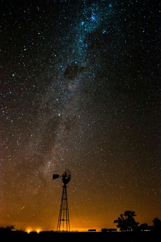 a sky filled with lots of stars next to a windmill, by Peter Churcher, southern cross, daniel richter, afar, canvas