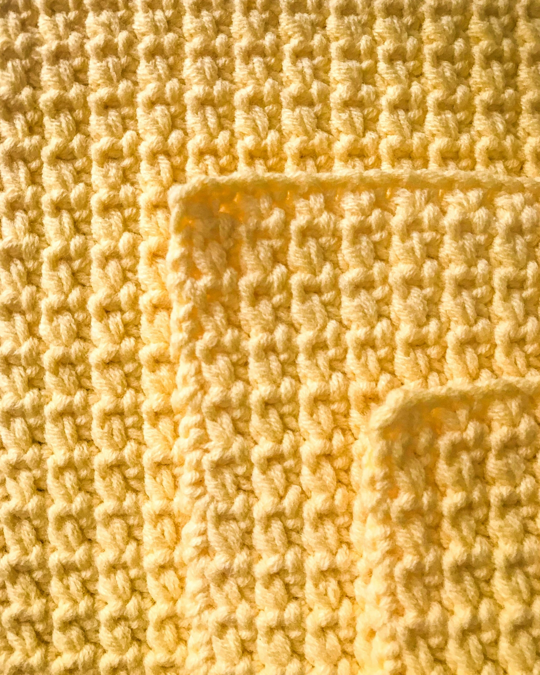 a close up of a yellow knitted blanket, dau-al-set, different sizes, forward facing, 3 - piece, 1 6 x 1 6