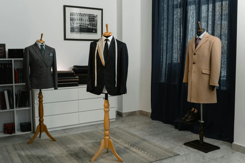 three men's suits on mannequins in a room, by Emma Andijewska, inside a grand studio, handcrafted, 15081959 21121991 01012000 4k, royal robe