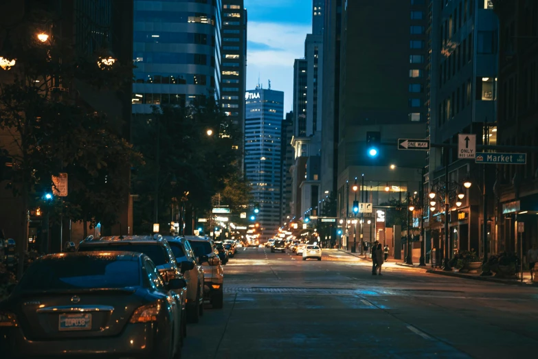 a city street filled with lots of traffic at night, pexels contest winner, minneapolis, fan favorite, street of teal stone, city morning