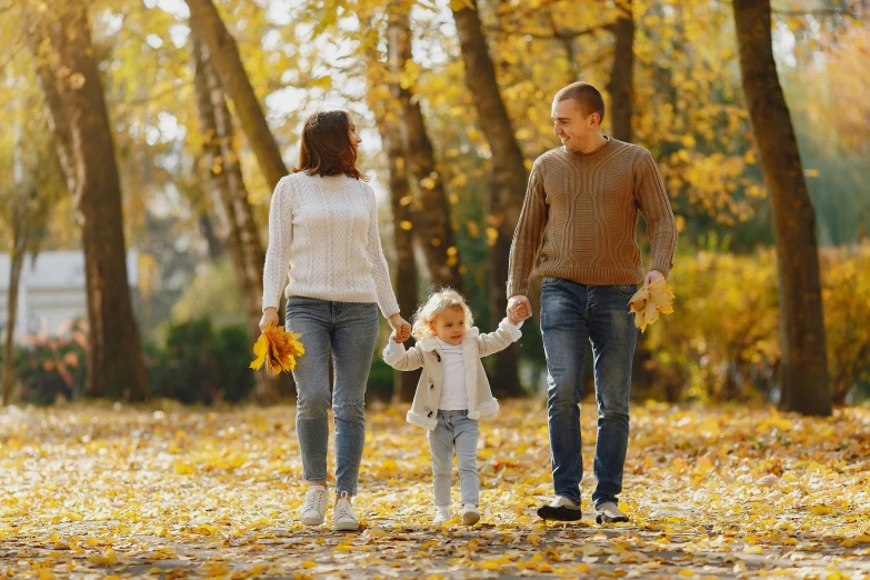 a family walking through a park in the fall, by Maksimilijan Vanka, pexels, avatar image, casual clothing, russian, cute and lovely