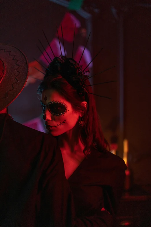 a couple of people that are standing in the dark, celebrating day of the dead, headpiece, film still promotional image, profile image