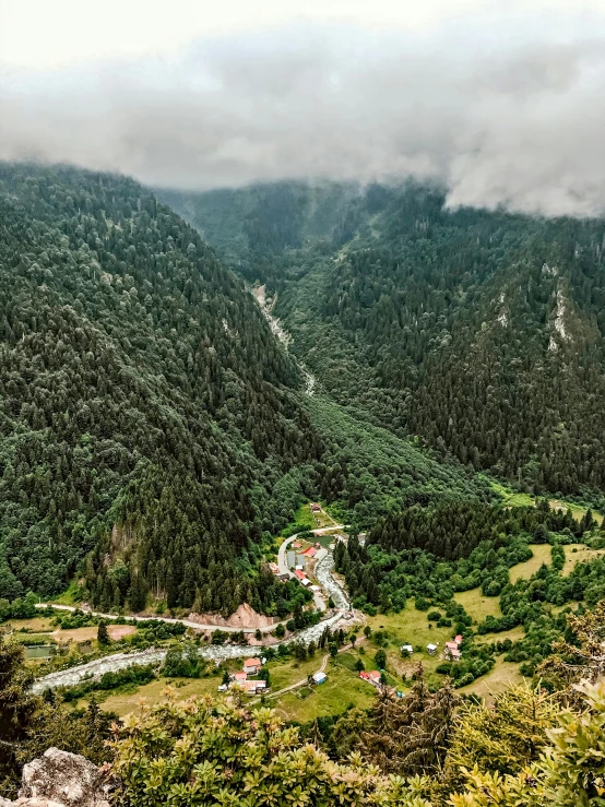 a view of a valley from the top of a mountain, by Emma Andijewska, pexels contest winner, renaissance, hideen village in the forest, larapi, thumbnail, panoramic