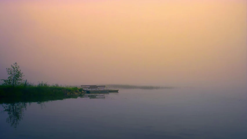a boat sitting on top of a body of water, by Attila Meszlenyi, pexels contest winner, romanticism, faded glow, nile river environment, panoramic shot, near a jetty