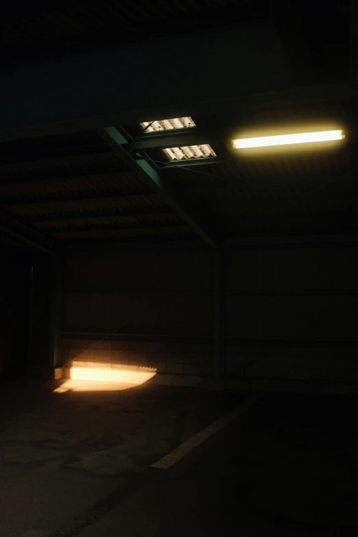 a fire hydrant sitting in the middle of a dark room, by Daarken, light and space, inside a farm barn, volumetric lighting - n 9, inside a shed, volumetric lighting!!