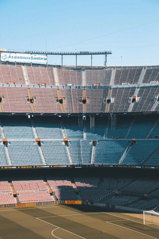 a soccer stadium filled with lots of empty seats, by Carey Morris, unsplash, conceptual art, 2 5 6 x 2 5 6 pixels, fc barcelona, nfl, seen from a distance