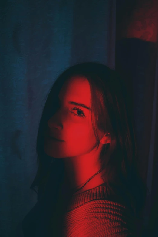 a woman standing in front of a red light, inspired by Elsa Bleda, serial art, profile pic, high quality portrait, halfbody headshot, indoor picture