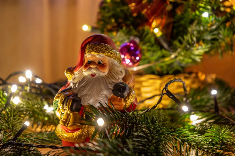 a close up of a figurine on a christmas tree, a portrait, pexels, santa claus, lights, brown, retro vibe