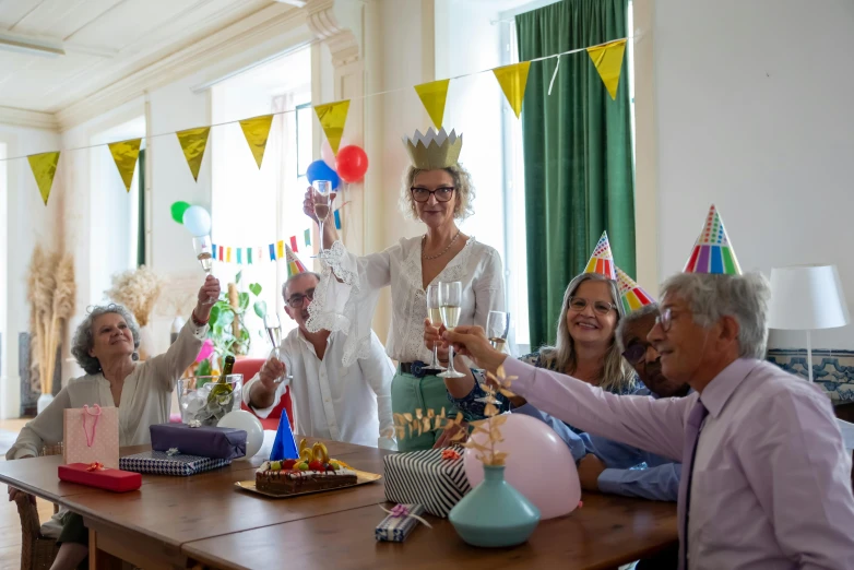 a group of people celebrating a birthday party, by Jan Tengnagel, happening, 70 years old, fan favorite, decorations, high quality picture