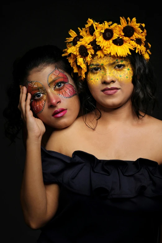 two women with sunflowers painted on their faces, by reyna rochin, album cover, glitter, hispanic, high quality photo