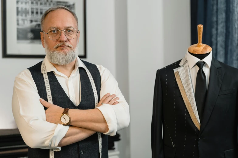 a man standing next to a mannequin wearing a suit, a portrait, inspired by Albert Paris Gütersloh, pexels contest winner, art nouveau, dmitry bogdanov, wearing a pinstripe suit, expert design, kris kuksi