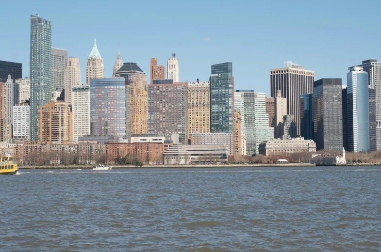 a large body of water with a city in the background, new york backdrop, slide show, complex buildings, 2 0 2 2 photo