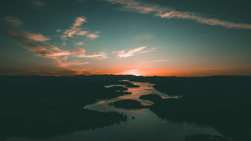 the sun is setting over a body of water, pexels contest winner, sky - high view, paul barson, thumbnail, high quality upload