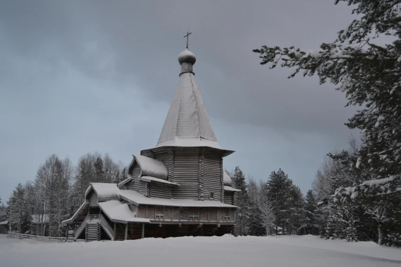 a church sitting in the middle of a snow covered field, inspired by Andrei Rublev, pexels contest winner, hurufiyya, wooden, grayish, 000 — википедия, pine