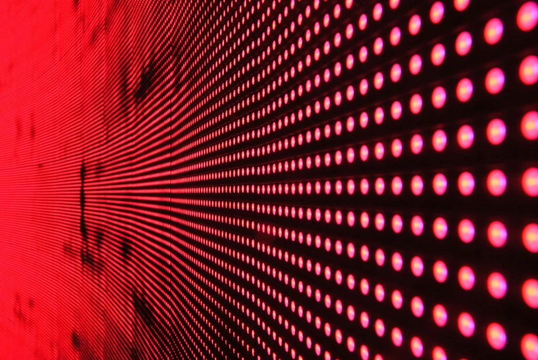 a close up of a red light on a wall, video art, skin made of led point lights, large commercial led screens, led light strips, neon electronic signs