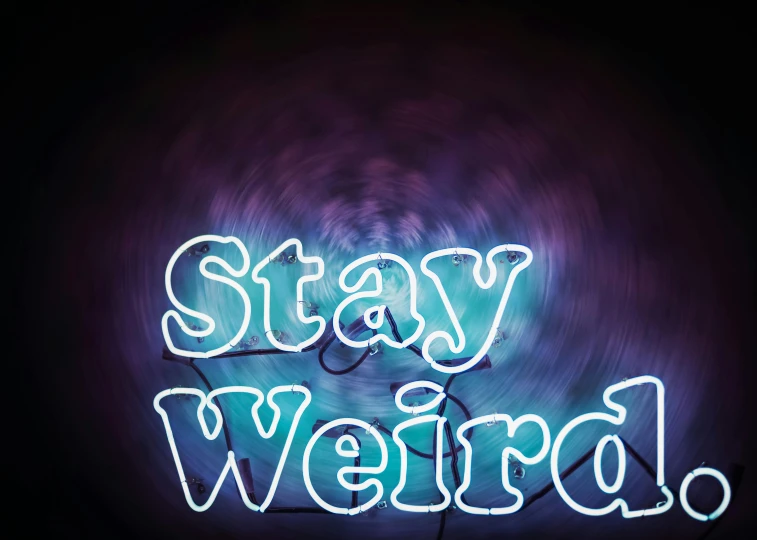 a neon sign that says stay weird, an album cover, inspired by Cerith Wyn Evans, trending on pexels, swirling bioluminescent energy, family photo, weird west, weird creatures