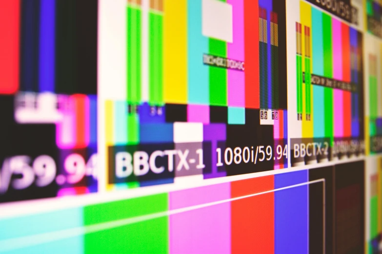 a close up of a television screen with no signal, by Joe Bowler, shutterstock, video art, triadic color grading, bbc promotional artwork, youtube thumbnail, colorful digital screens) xf iq4