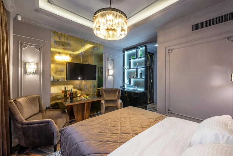 a bed room with a neatly made bed and a chandelier, by Julia Pishtar, unsplash, art nouveau, gentleman's club lounge, grey and gold color palette, wide high angle view, video