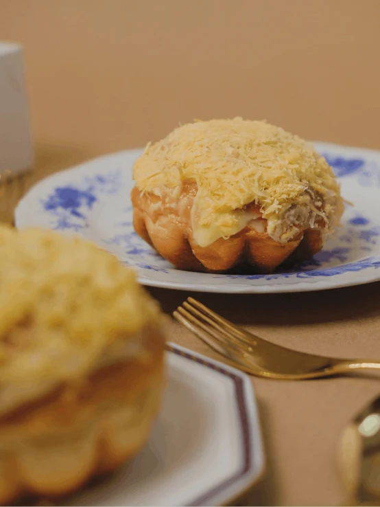 a close up of a plate of food on a table, a pastel, inspired by Richmond Barthé, tumblr, rococo, blender donut, made of cheese, colombian, profile image