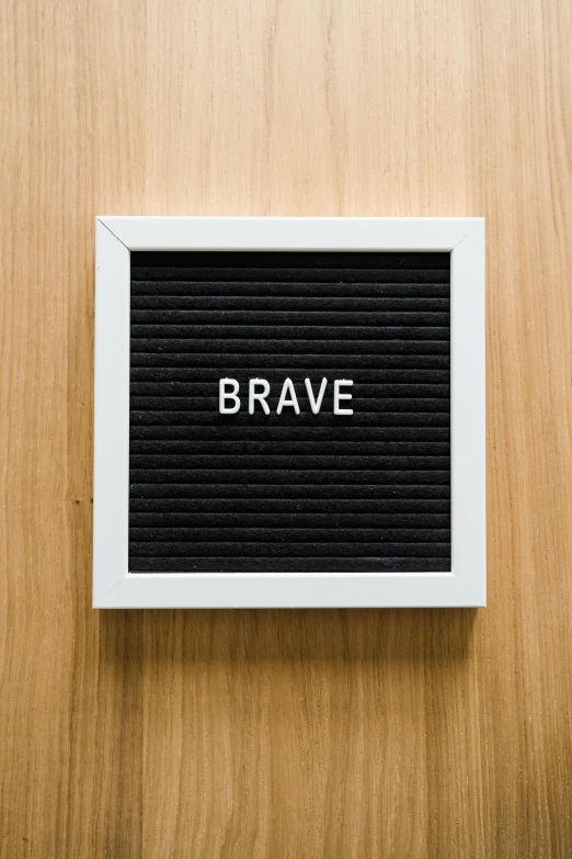 a wooden letter board with the word brave written on it, unsplash contest winner, square, profile picture 1024px, armor plate, crypto