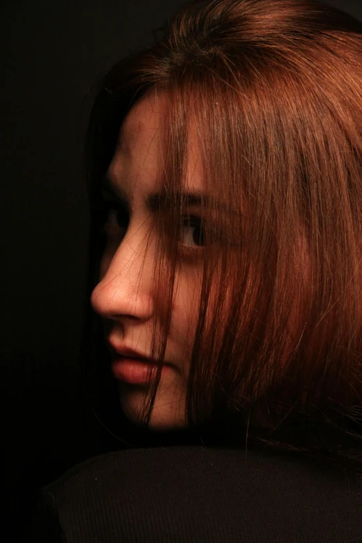 a close up of a person with a cell phone, a character portrait, by irakli nadar, flickr, dark auburn hair, profile portrait, portrait of morana, taken in the late 2010s