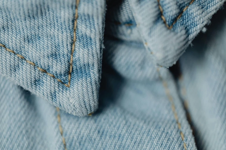 a close up of a pair of jeans, by Matija Jama, trending on unsplash, blue-fabric, light blues, low detailed, alessio albi