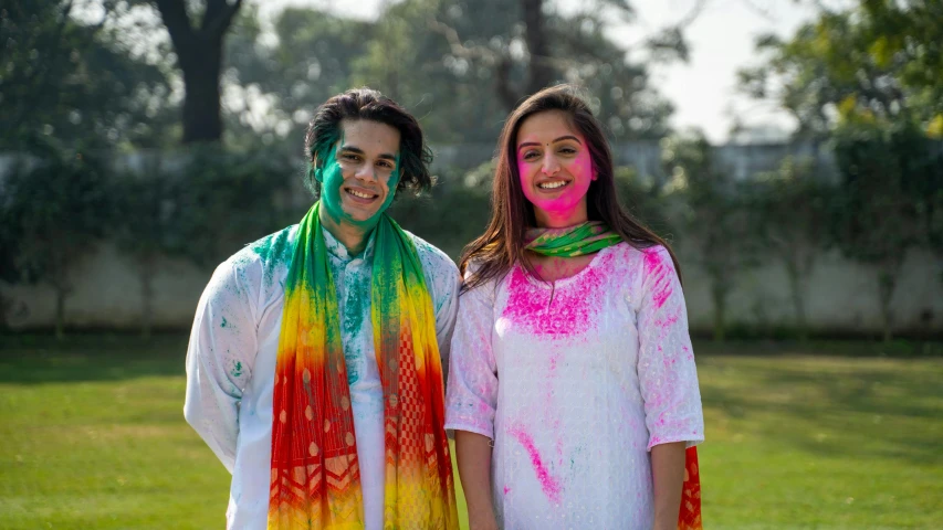 a couple of women standing next to each other, pexels contest winner, color field, wearing a kurta, wearing a tie-dye shirt, college students, wearing white clothes