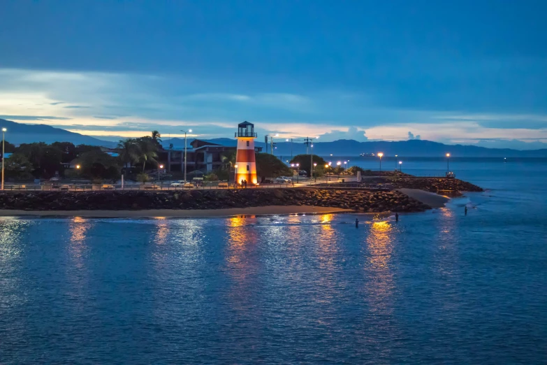 a lighthouse in the middle of a body of water, victorian harbour night, beachfront, listing image, golden hour photo