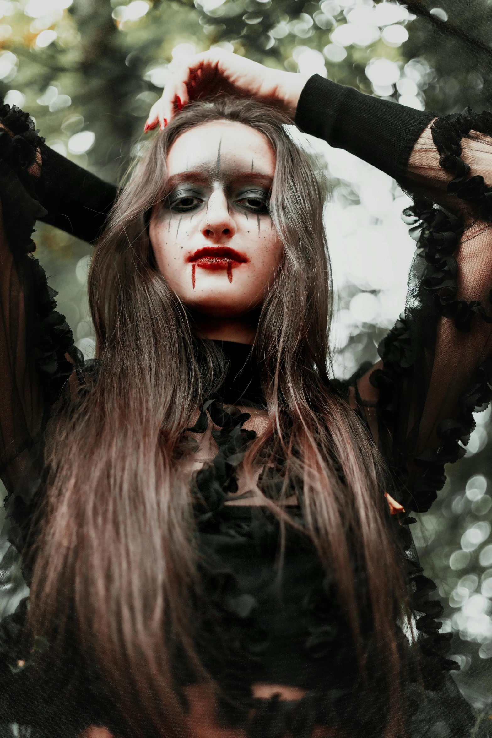 a woman in a black dress with blood on her face, an album cover, inspired by Kati Horna, pexels contest winner, gothic art, black metal concert flyer, beautiful witch with long hair, snapchat photo, beautiful frankenstein