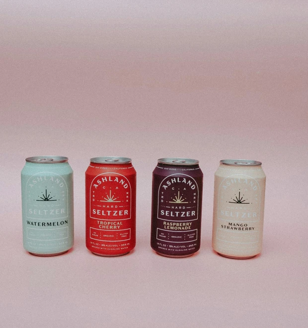 three cans of beer sitting next to each other, minimal pink palette, payne's grey and venetian red, many stars, ballard