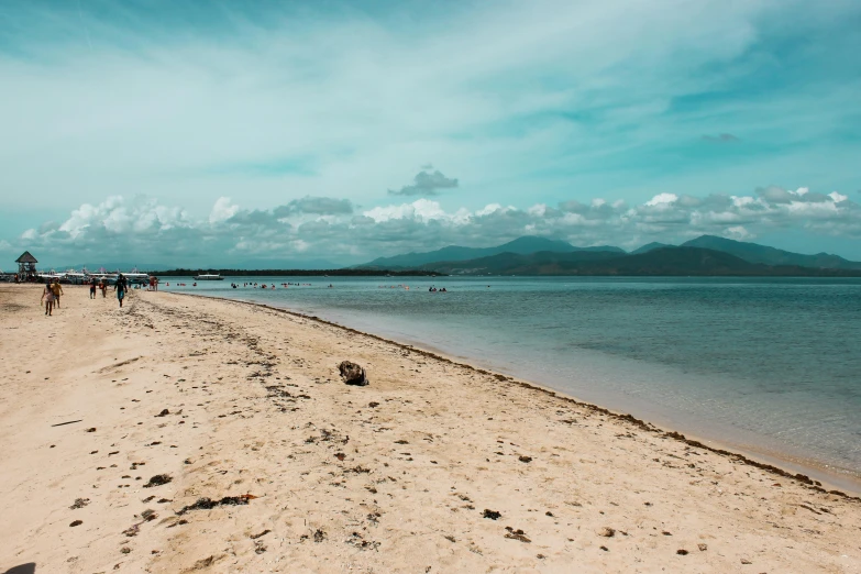 a group of people walking along a sandy beach, by Robbie Trevino, pexels contest winner, great barrier reef, background image, philippines, thumbnail