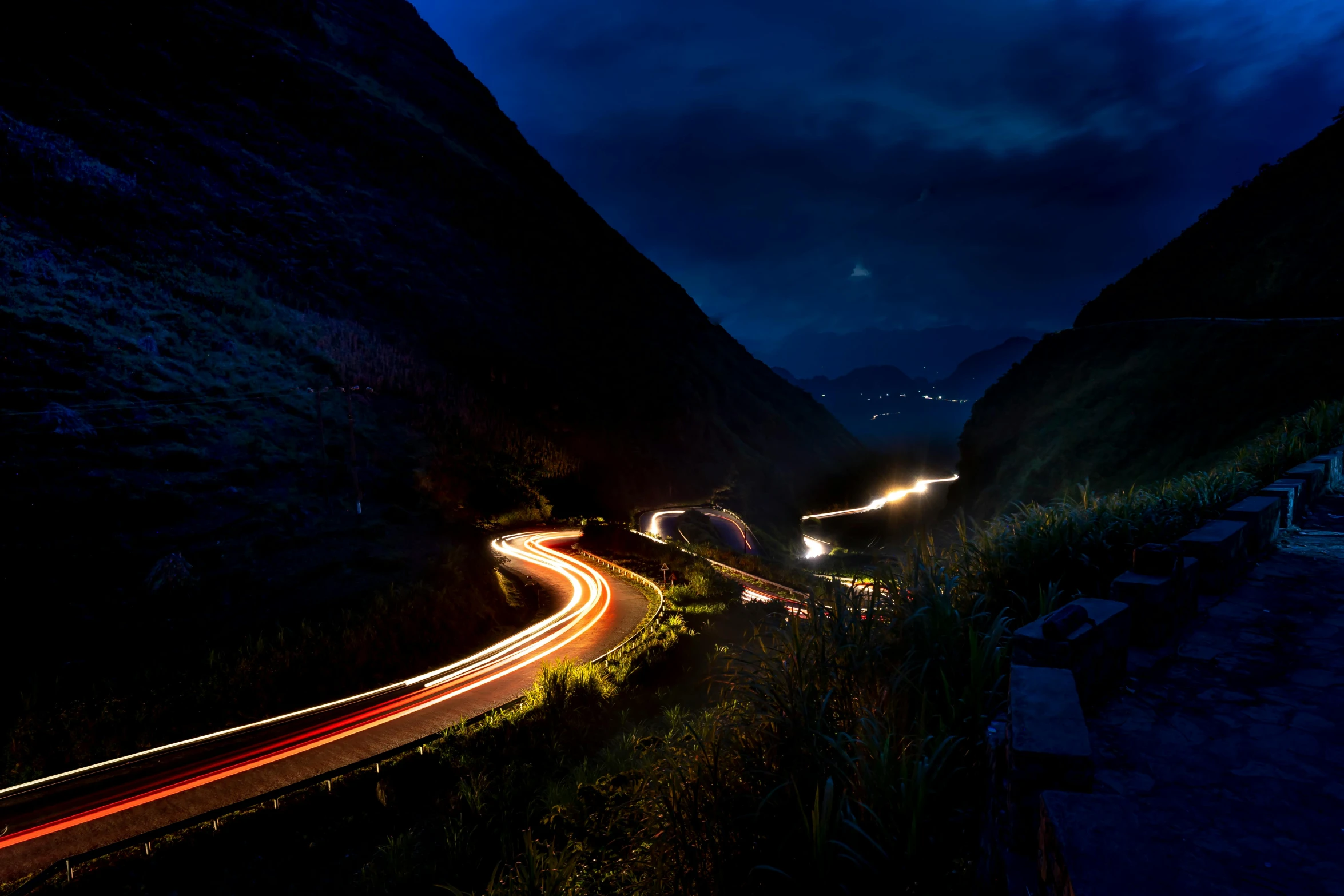 a long exposure photo of a highway at night, by Werner Andermatt, unsplash contest winner, hurufiyya, uttarakhand, summer evening, peru, hobbiton at night