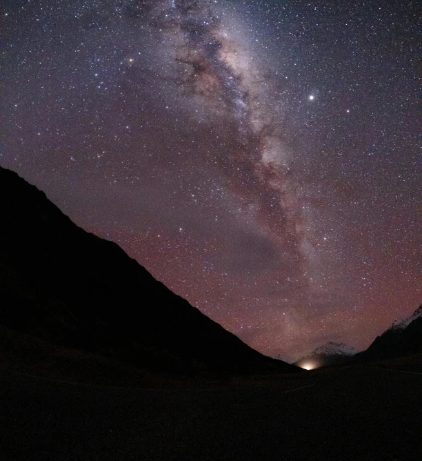 the milky shines brightly in the night sky, an album cover, by Peter Churcher, pexels contest winner, hurufiyya, new zealand, andes, brown, unsplash photo contest winner