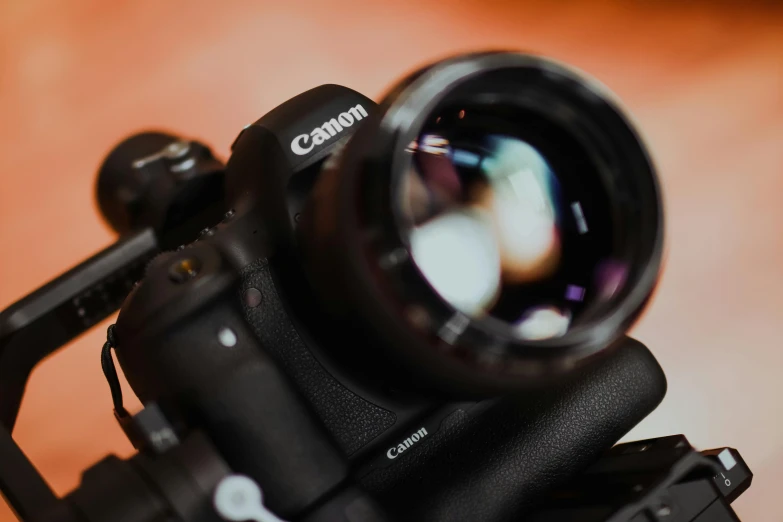 a close up of a camera on a tripod, by Carey Morris, unsplash, canon macro lens, instagram post, cannon ef 6 5 mm f / 2. 8, today\'s featured photograph 4k