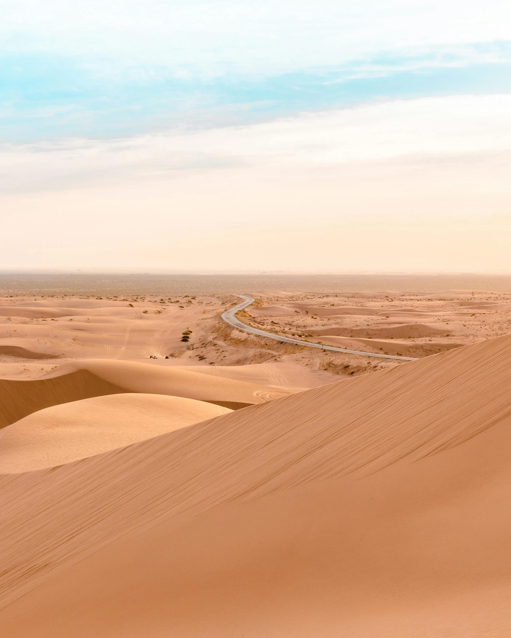 a person riding a horse in the desert, in the middle of the desert