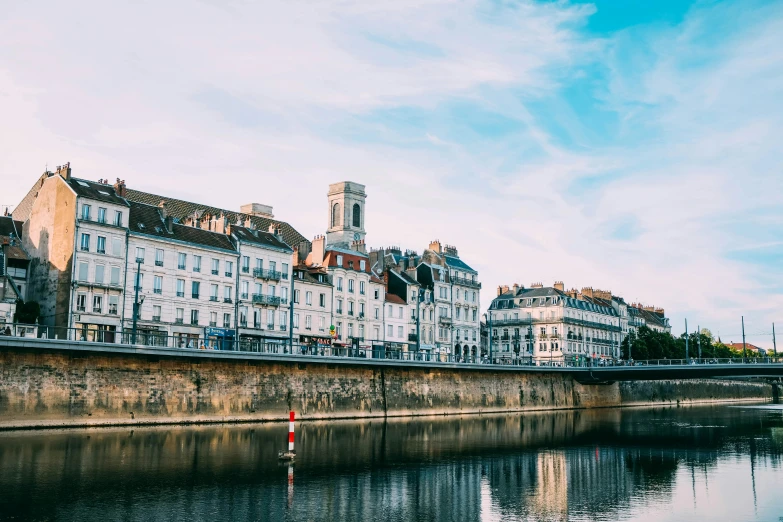 a river running through a city next to tall buildings, a photo, by Raphaël Collin, pexels contest winner, renaissance, rennes - le - chateau, white houses, natural morning light, flat illustration