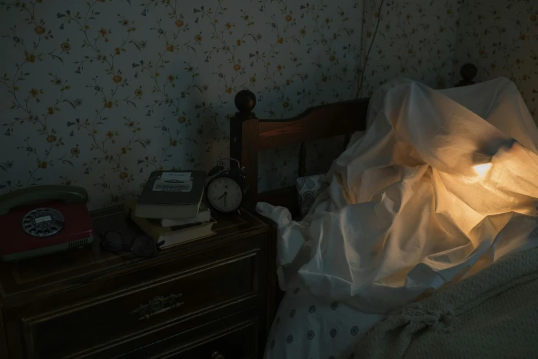 a bed sitting in a bedroom next to a night stand, by Elsa Bleda, pexels contest winner, hyperrealism, spooky lighting, ignant, nighttime scene, melanchonic soft light