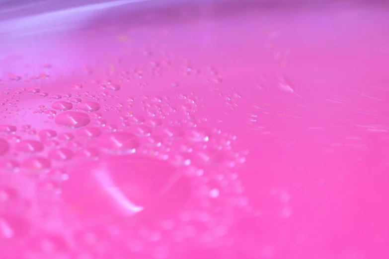 a close up of water droplets on a pink surface, molecular gastronomy, 4 k hd wallpapear, color”, pink axolotl in a bucket