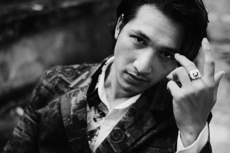 a black and white photo of a man with a ring on his finger, a black and white photo, inspired by Yamagata Hiro, shin hanga, adam driver, doing an elegant pose over you, yoshifumi ushima, portrait image