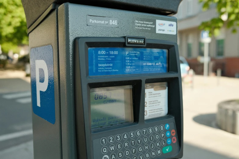 a parking meter sitting on the side of a street, les automatistes, blue print, square, up close picture