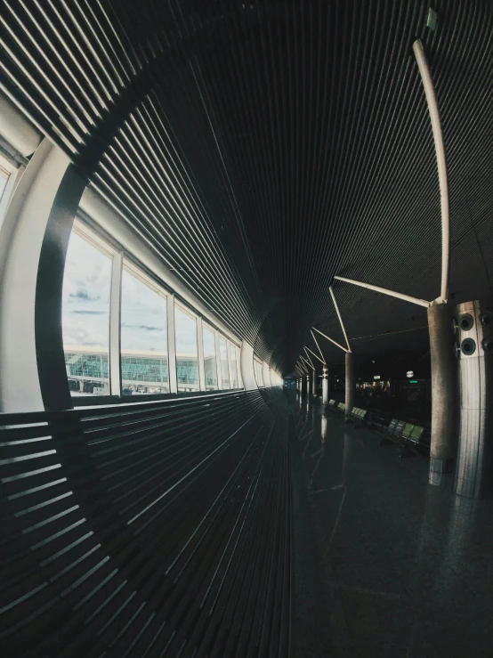 a black and white photo of a train station, unsplash contest winner, light and space, distorted photo, black. airports, view from inside, ilustration