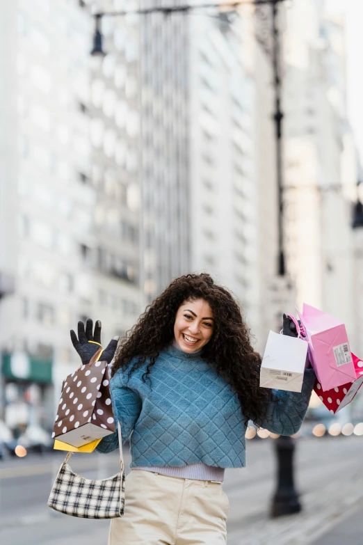 a woman walking down the street holding shopping bags, pexels contest winner, happening, all overly excited, square, plus size woman, holiday