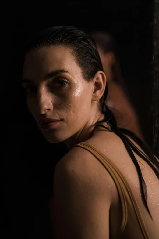 a beautiful young woman standing in front of a mirror, inspired by Nan Goldin, pexels contest winner, hyperrealism, muscular sweat lara croft, middle eastern skin, wet look, studio shoot