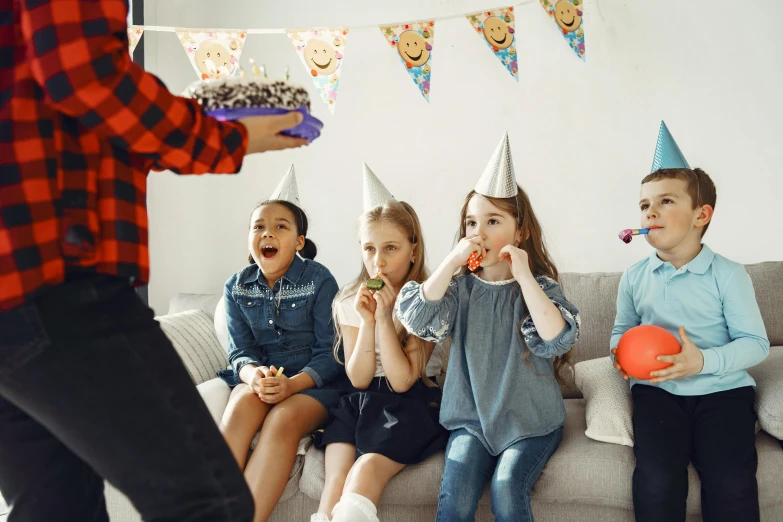 a group of children sitting on top of a couch, party hats, serving happy meals, profile image, fan favorite