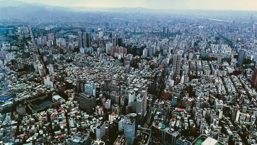 a large city filled with lots of tall buildings, inspired by Thomas Struth, pexels contest winner, taiwan, aerial viewyoji shinkawa, annie liebowitz, a quaint