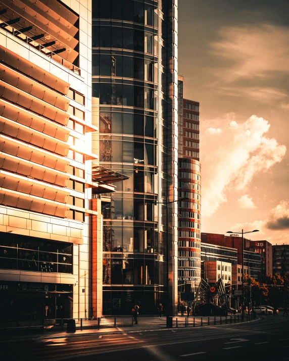 a city street filled with lots of tall buildings, a screenshot, pexels contest winner, modernism, golden hour photo, glass and steel, bauhaus architecture, today\'s featured photograph 4k